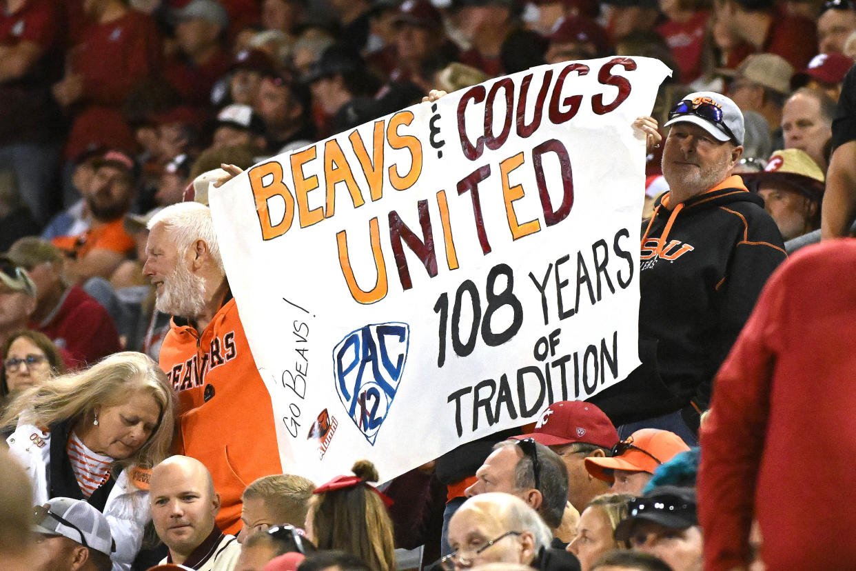 Sep 23, 2023; Pullman, Washington, USA; Oregon State Beavers fans hold up a sign about the Pac 2 during a game against the Washington State Cougars in the second half at Gesa Field at Martin Stadium. Washington State won 38-35. Mandatory Credit: James Snook-USA TODAY Sports