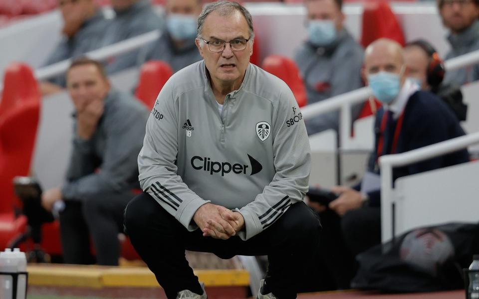 Marcelo Bielsa squatting - NMC POOL