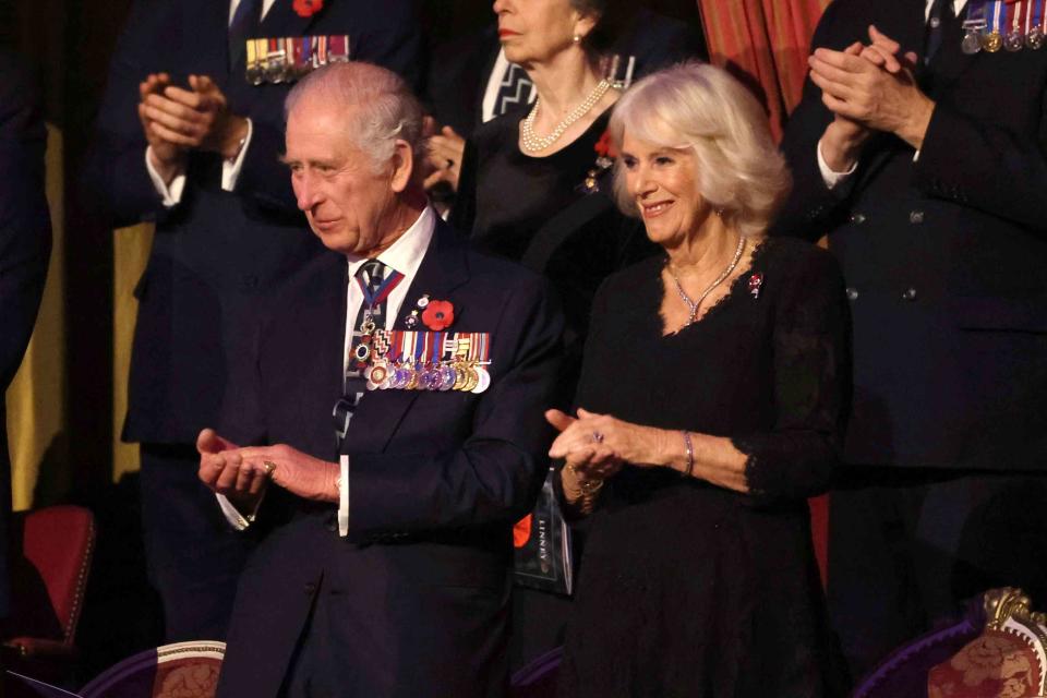 <p> Chris Jackson/Getty </p> King Charles and Queen Camilla attend the Festival of Remembrance at Royal Albert Hall in London on Nov. 11, 2023.