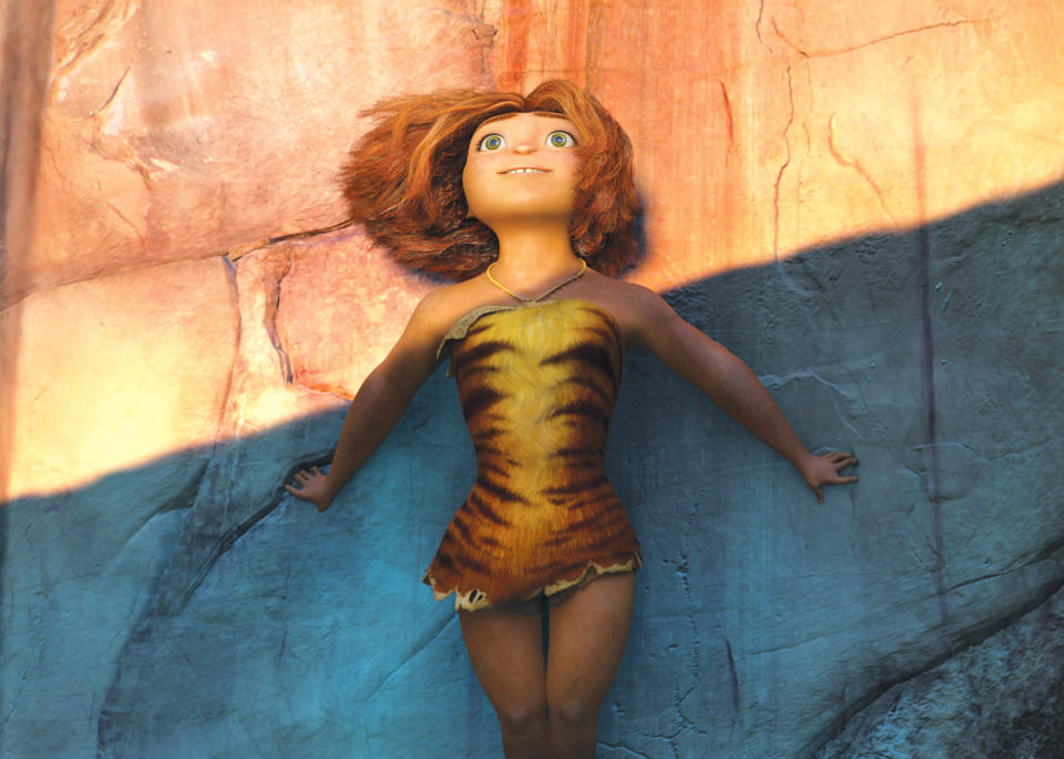 This film publicity image released by DreamWorks Animation shows the character Eep, voiced by Emma Stone, in a scene from "The Croods." (AP Photo/DreamWorks Animation)