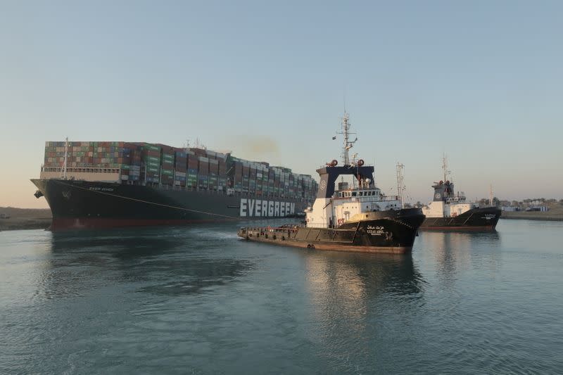 A view shows the container ship Ever Given, one of the world's largest container ships, after it was partially refloated, in Suez Canal