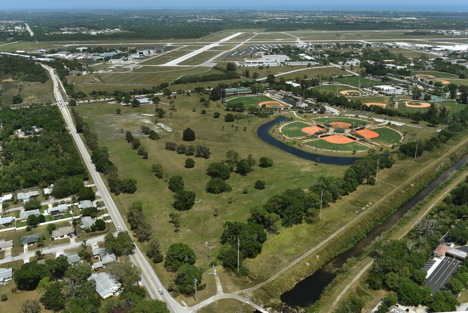 An aerial photo of the former Dodgertown Golf Club property is seen alongside Historic Dodgertown, right, and the Vero Beach Regional Airport, background, on Monday, April 3, 2017, in Vero Beach, Florida. In 2019, Indian River County bought the old golf course from the city with plans to turn it into a park and parking for what has become the Jackie Robinson Training Complex.