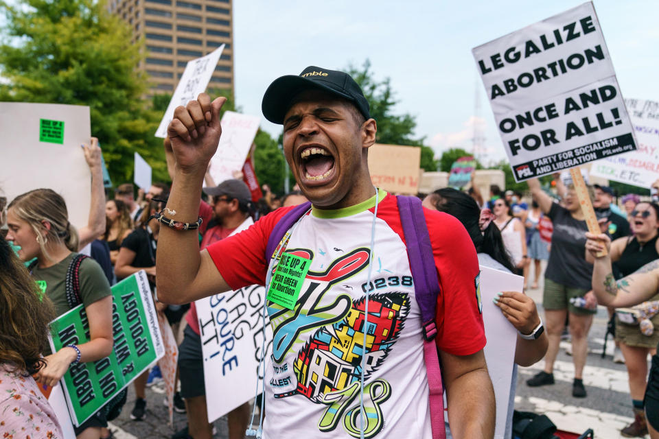 People participate in a call and response to protest the Supreme Court's decision in the Dobbs v Jackson Women's Health case on June 24, 2022 in Atlanta. (Elijah Nouvelage / Getty Images)