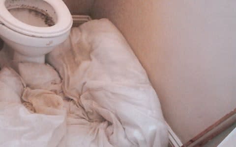Toilet plugged by a duvet in victim's living quarters - Credit: West Midlands Police/PA