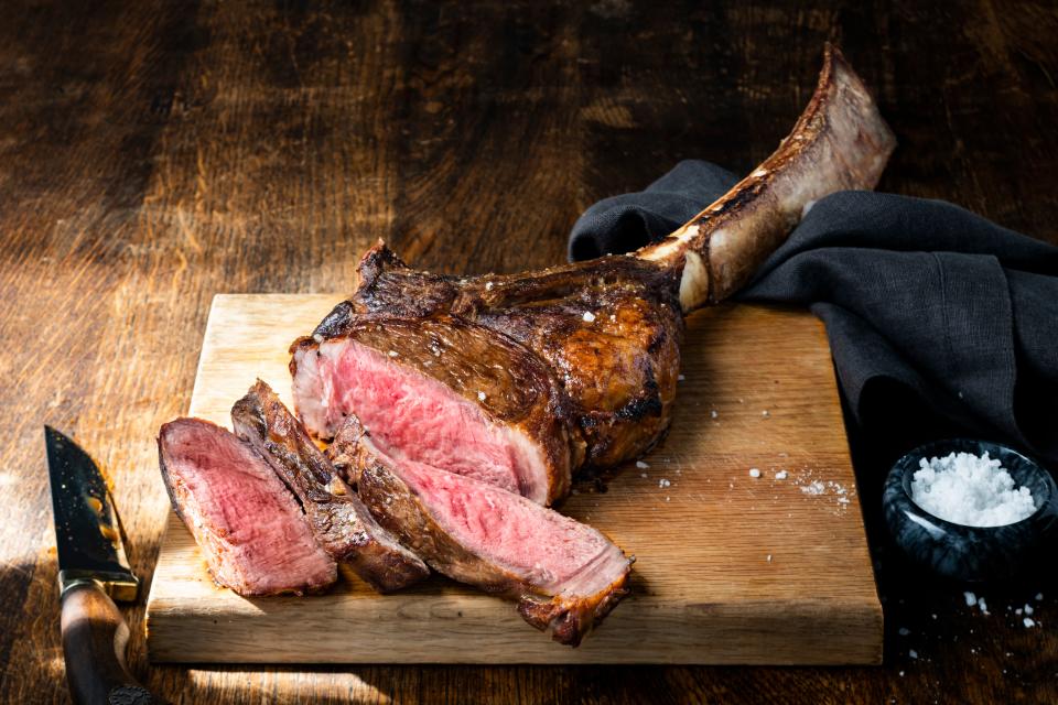 A sliced Tomahawk steak from Fogo de Chao Brazilian Steakhouse.