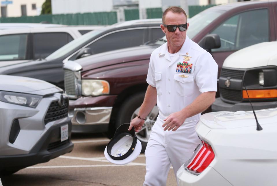 Navy SEAL Edward Gallagher walks into military court in San Diego, California, June 21, 2019.