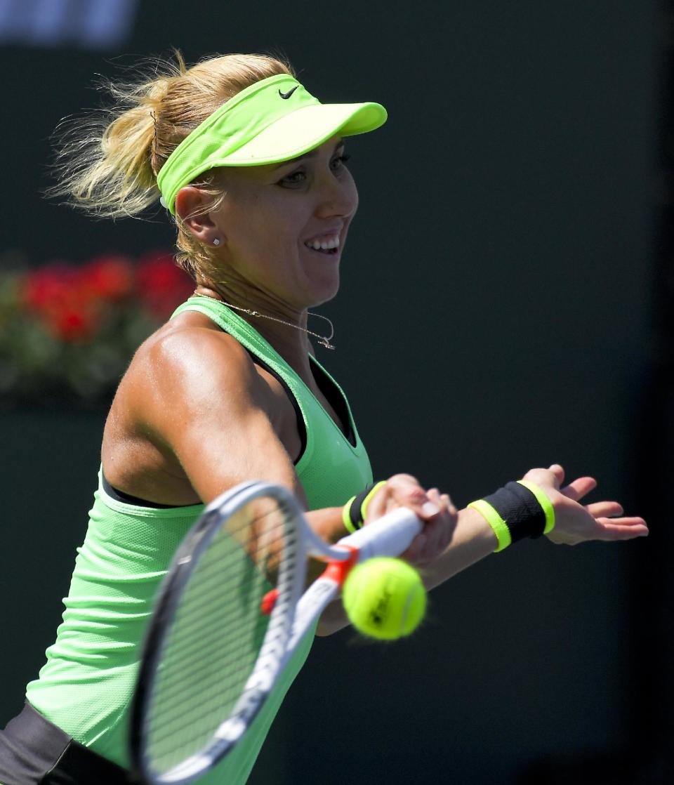 Elena Vesnina, of Russia, hits to Svetlana Kuznetsova, also of Russia, during a final match at the BNP Paribas Open tennis tournament, Sunday, March 19, 2017, in Indian Wells, Calif. (AP Photo/Mark J. Terrill)