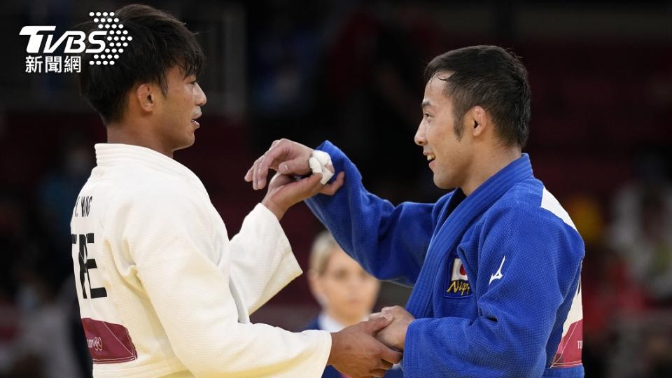 楊勇緯對上日本選手高藤直壽。（圖／達志影像美聯社）