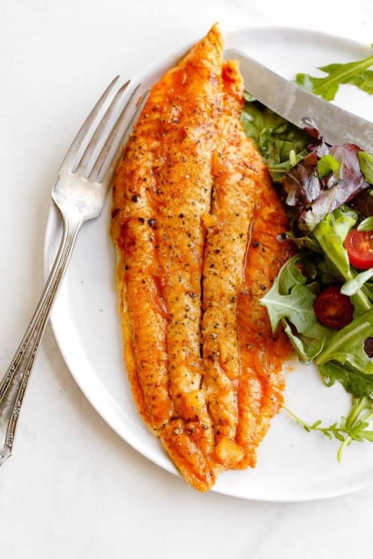 <p>Grandbaby Cakes</p><p>A simple yet flavorful grilled fish recipe made with just a few ingredients including a honey bourbon marinade. It is perfect for work days or weekend entertaining!</p><p><strong>Get the Recipe: </strong><a href="https://grandbaby-cakes.com/grilled-catfish-recipe/" rel="nofollow noopener" target="_blank" data-ylk="slk:Pineapple Honey Bourbon Grilled Catfish;elm:context_link;itc:0;sec:content-canvas" class="link rapid-noclick-resp"><strong>Pineapple Honey Bourbon Grilled Catfish</strong></a></p><p><strong>Related: <a href="https://parade.com/1302575/parade/asparagus-recipes/" rel="nofollow noopener" target="_blank" data-ylk="slk:60 Best Asparagus Recipes with Different Ways to Cook It;elm:context_link;itc:0;sec:content-canvas" class="link rapid-noclick-resp">60 Best Asparagus Recipes with Different Ways to Cook It</a></strong></p>