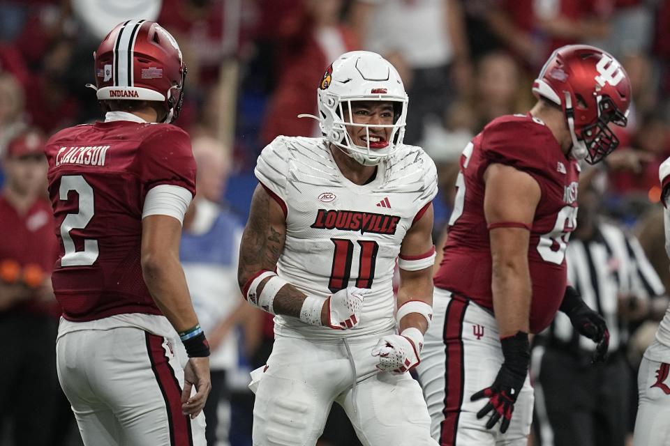 Louisville defensive back Cam'Ron Kelly (11) reacts after a tackle during the second half of an NCAA college football game against Indiana, Saturday, Sept. 16, 2023, in Indianapolis. (AP Photo/Darron Cummings)