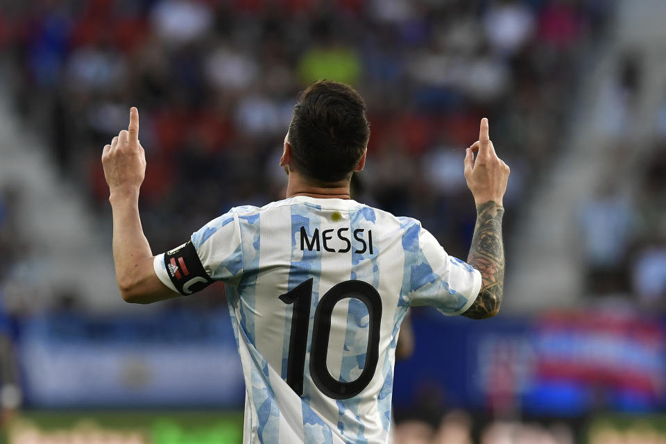 Argentina's Lionel Messi celebrates scoring his side's third goal during a friendly match against Estonia at El Sadar stadium in Pamplona, northern Spain, Sunday, June 5, 2022. (AP Photo/Alvaro Barrientos)