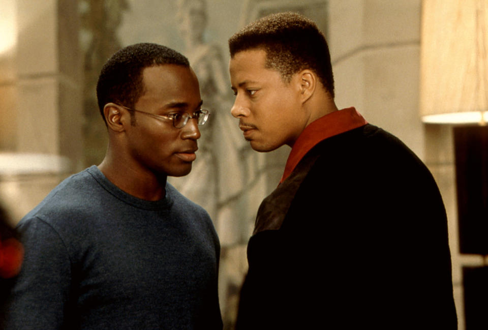Taye Diggs and Terrence Howard stare at each other