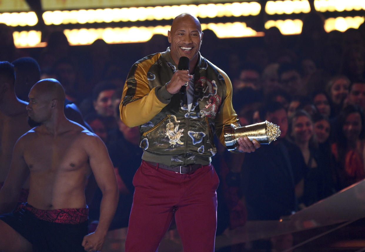 Dwayne Johnson, also known as The Rock, accepts the generation award at the MTV Movie and TV Awards on Saturday, June 15, 2019, at the Barker Hangar in Santa Monica, Calif. (Photo by Chris Pizzello/Invision/AP)