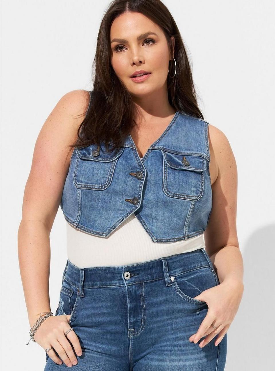 <p><a href="https://go.redirectingat.com?id=74968X1596630&url=https%3A%2F%2Fwww.torrid.com%2Fproduct%2Fvintage-stretch-denim-v-neck-vest%2F40360252.html&sref=https%3A%2F%2F" rel="nofollow noopener" target="_blank" data-ylk="slk:Shop Now;elm:context_link;itc:0;sec:content-canvas" class="link ">Shop Now</a></p><p>Vintage Stretch Denim V-neck Vest</p><p>$42.83</p>