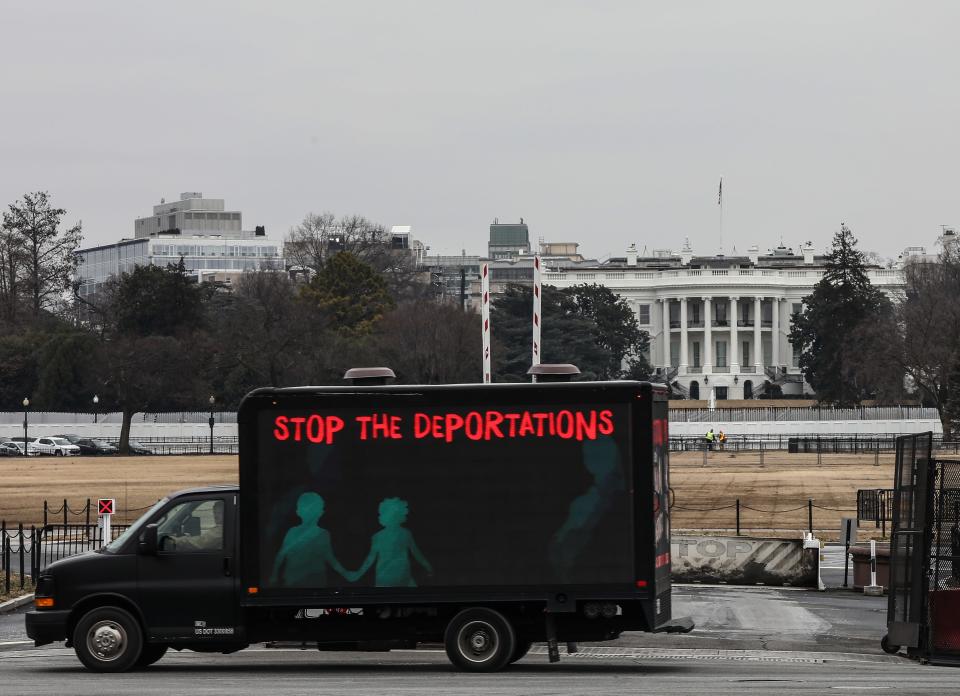 WASHINGTON, DC - FEBRUARY 15: An L.E.D. truck displaying messages expressing concern over the continuing mass deportations of Black immigrants drives past the White House prior to a #BidenAlsoDeports rally on February 15, 2021 in Washington, DC..  The rally was held to raise the alarm over continued mass deportations of Black immigrants.  Advocates say that unraveling the Migrant Protection Protocols (MPP) does not protect Black immigrants and that the US government is using Title 42 to weaponize the Covid19 public health crisis by â€œexpellingâ€/ deporting Black immigrants. Groups who rallied included Haitian Bridge Alliance,  Black Alliance for Just Immigration, African Bureau for Immigration and Social Affairs (ABISA), Black Immigrant Collective (BIC), Black Immigrants Bail Fund, Migration Matters, and Refugee African Communities Together.   (Photo by Jemal Countess/Getty Images for UndocuBlack Network)