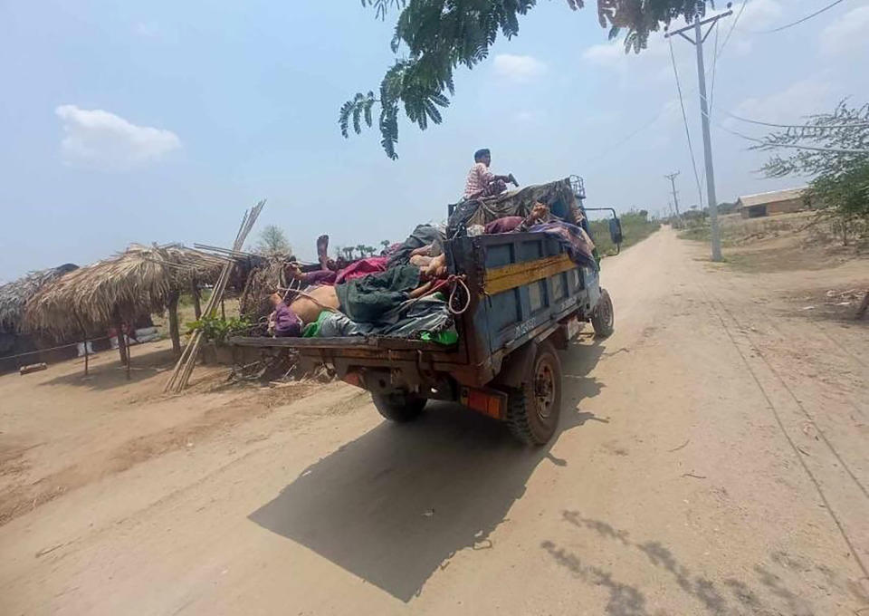 This UGC photo provided by the People’s Defense Force shows a truck transporting bodies of victims allegedly killed by soldiers of Myanmar’s military government, to be buried outside of Let Htoke Taw village in Sagaing region’s Myinmu township, Myanmar, Saturday, May 11, 2024. Reports that soldiers of Myanmar’s military government last week carried out a massacre of more than 30 civilians in a village in central Myanmar were supported Monday in interviews with a local administrator and a man who claims to have survived the killings. (People’s Defense Force via AP)