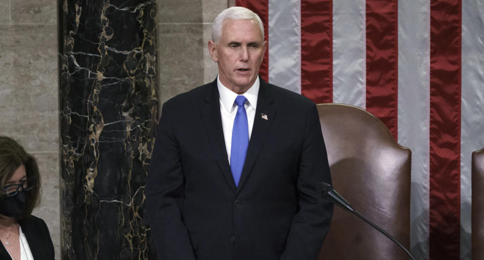 Vice President Mike Pence reads the final certification of Electoral College votes cast in November's presidential election during a joint session of Congress.