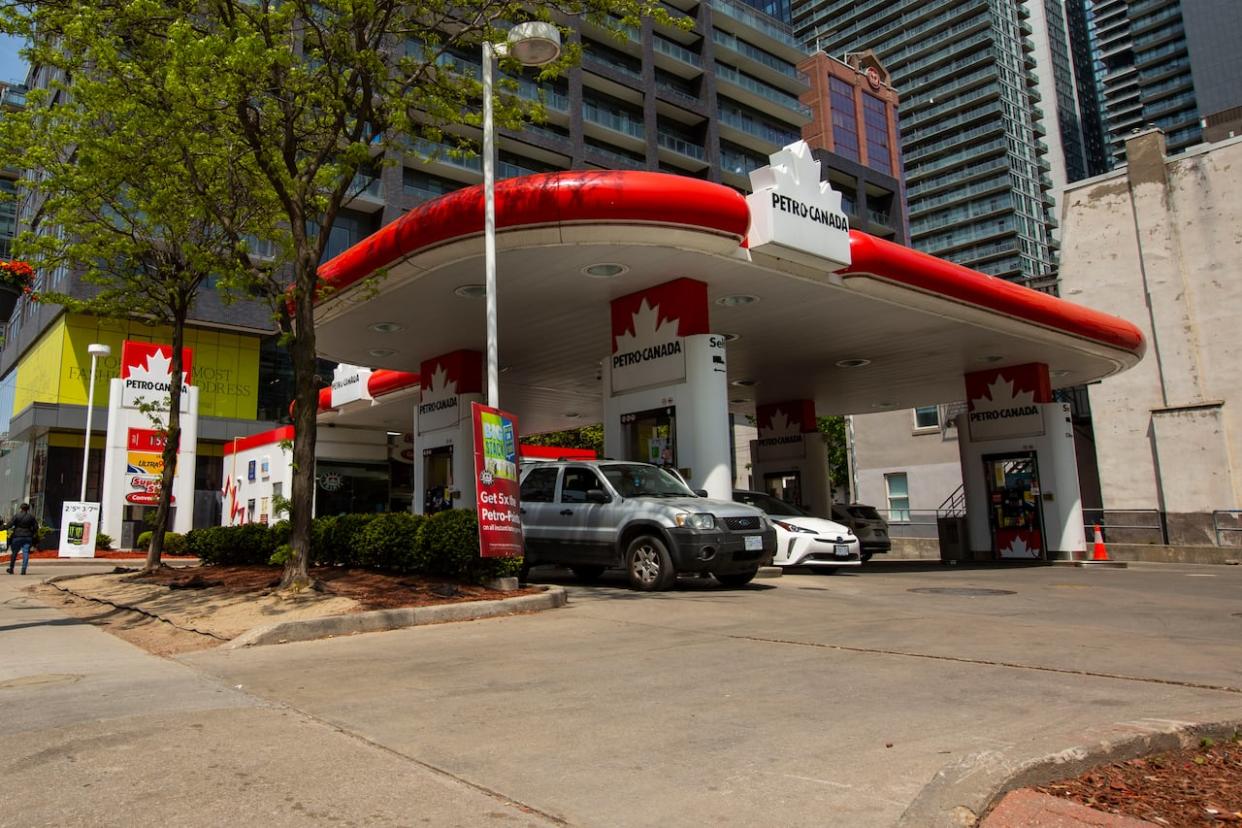 The Petro-Canada gas station on Spadina Avenue just south of King Street in Toronto in May. The company, which is owned by Calgary-based Suncor, confirmed last week it had experienced a cybersecurity incident that had disrupted debit and credit transactions at gas stations across the country.  (Michael Wilson/CBC - image credit)