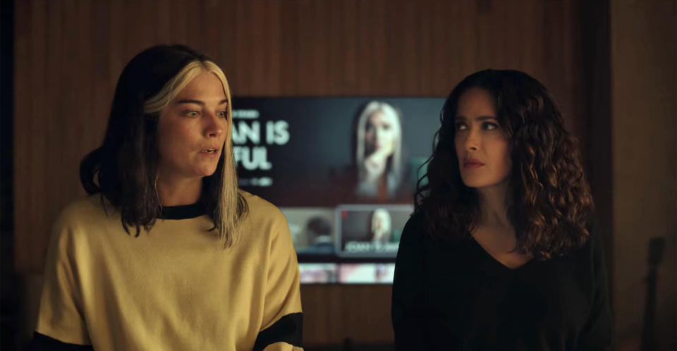 Annie Murphy as Joan and Salma Hayek as herself in 