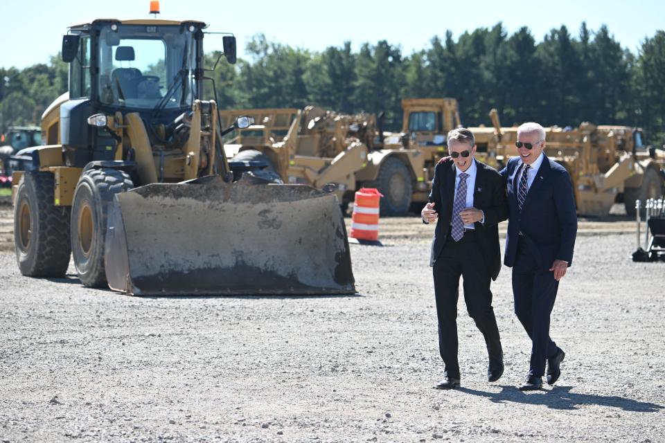 US President Joe Biden, with Intel CEO Pat Gelsinger (L), arrives to speaks about rebuilding US manufacturing through the CHIPS and Science Act at the groundbreaking of the new Intel semiconductor manufacturing facility near New Albany, Ohio, on September 9, 2022. (Photo by SAUL LOEB / AFP) (Photo by SAUL LOEB/AFP via Getty Images)