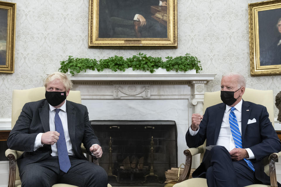 President Joe Biden, right, speaks during a meeting with British Prime Minister Boris Johnson in the Oval Office of the White House, Tuesday, Sept. 21, 2021, in Washington. (AP Photo/Alex Brandon)