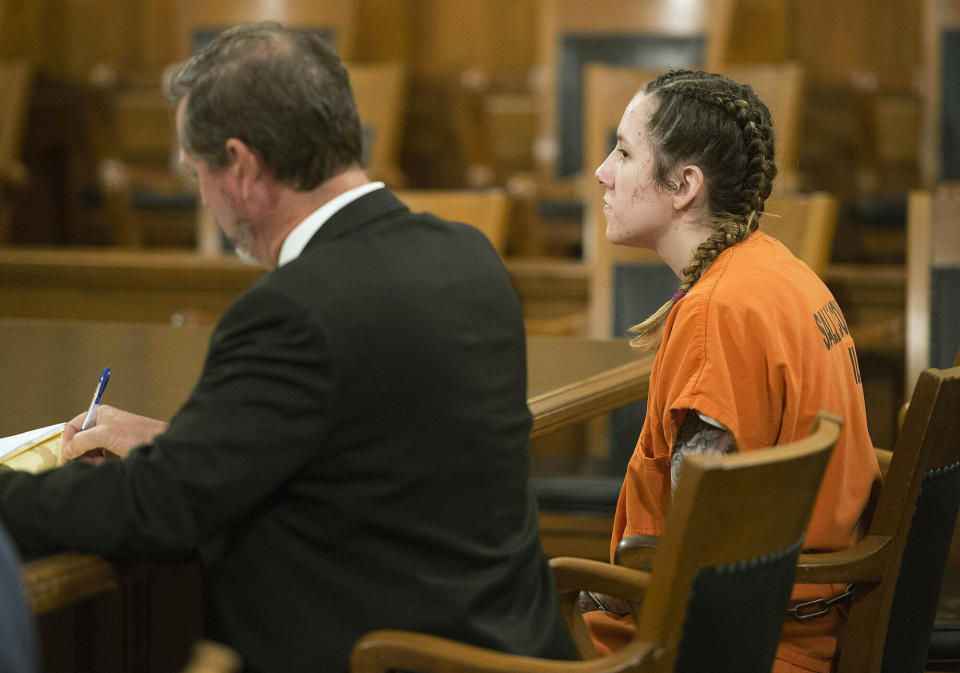 Bailey Boswell, right, listens during a hearing in Saline County Court in Wilbur, Nebraska.