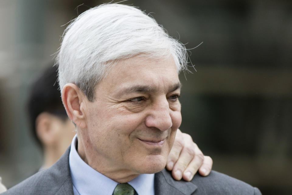 Former Penn State president Graham Spanier walks from the Dauphin County Courthouse in Harrisburg, Pa., Friday, March 24, 2017. Spanier was convicted Friday of hushing up suspected child sex abuse in 2001 by Jerry Sandusky, whose arrest a decade later blew up into a major scandal for the university and led to the firing of beloved football coach Joe Paterno. (AP Photo/Matt Rourke)