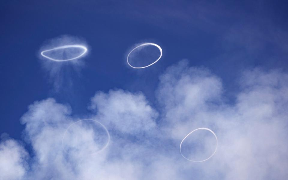 The volcanic vortex rings form when gases rise up from deep below the earth and escape inside the crater of a volcano