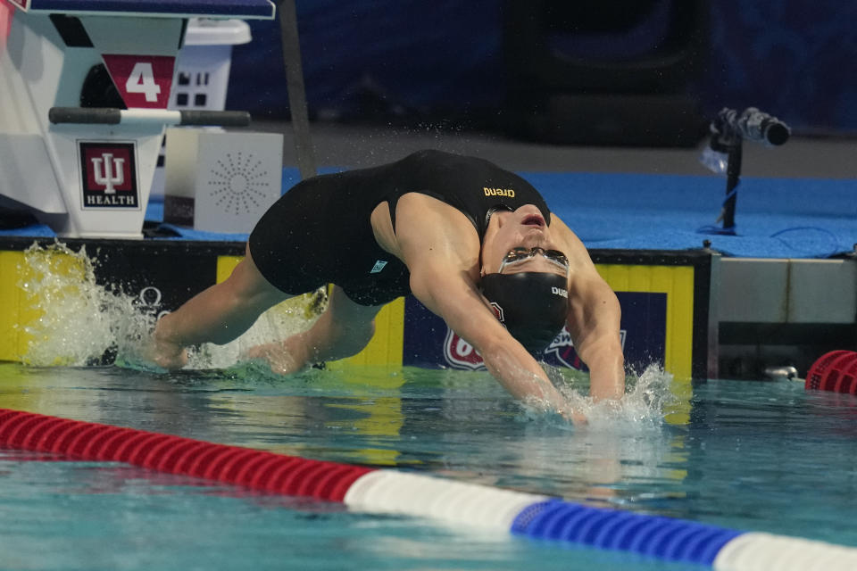 Katharine Berfkoff starts on her way to winning the women's 50-meter backstroke at the U.S. nationals swimming meet in Indianapolis, Thursday, June 29, 2023. (AP Photo/Michael Conroy)