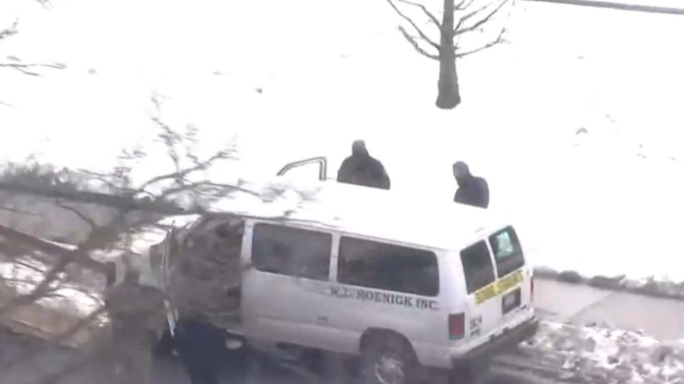 Police search a van outside of Oliver Citywide Academy in Pittsburgh on Wednesday, January 19, 2022. A student was shot inside of a school van just before school dismissal. / Credit: KDKA