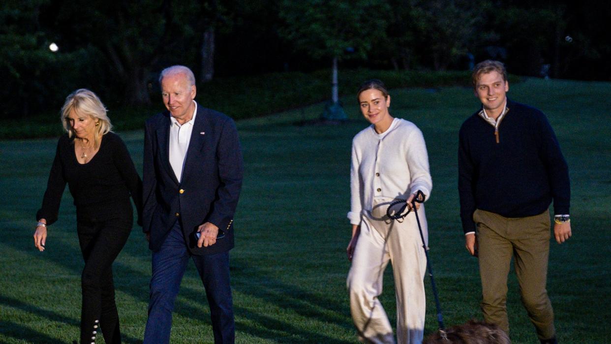 President Joe Biden, First Lady Jill Biden, grandaugher Naomi Biden and fiance Peter Neal walk to the White House from Marine One on June 20, 2022 in Washington, DC. The Bidens are returning from a long weekend in Rohoboth, Delaware