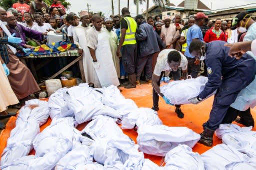 The victims' bodies are prepared for burial