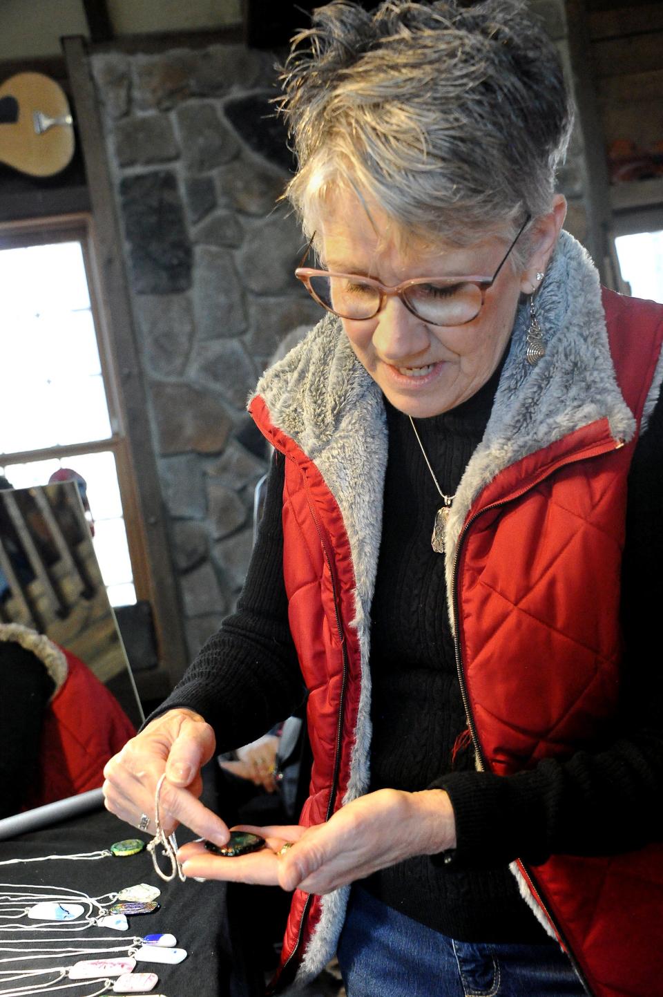 Kay Shue talks about some of the jewelry she makes and sells.