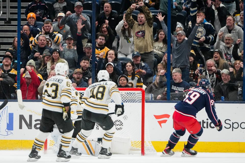 Nov 27, 2023; Columbus, Ohio, USA; Fans celebrate after Columbus Blue Jackets right wing Yegor Chinakhov (59) scores a goal past Boston Bruins goaltender Linus Ullmark (35) during the second period of the NHL game at Nationwide Arena.