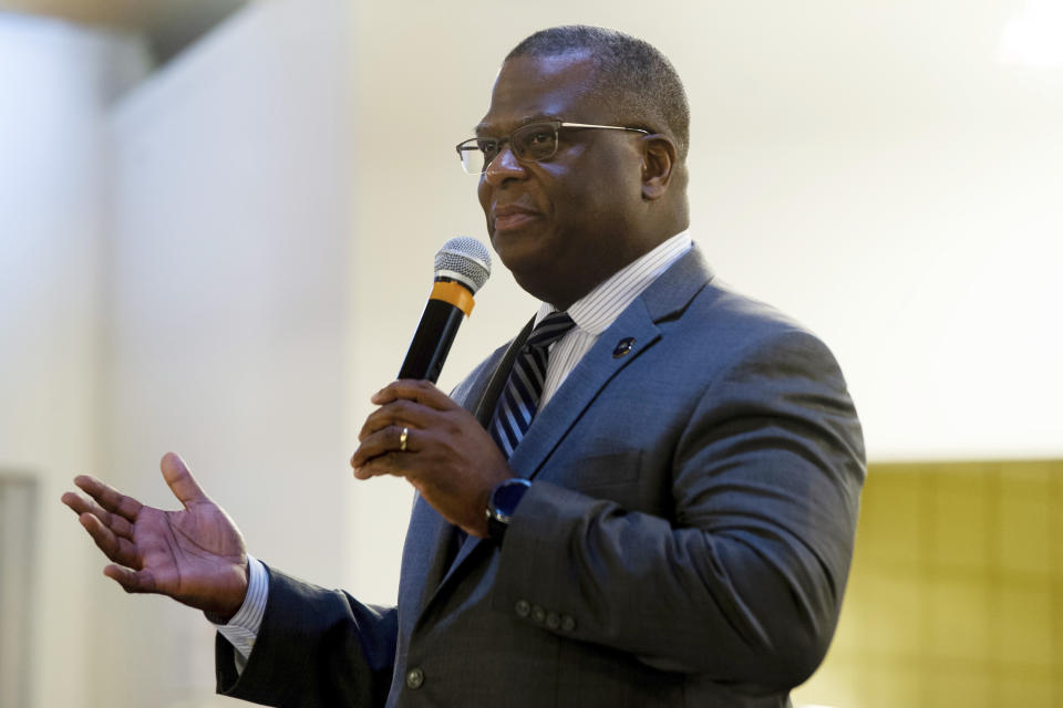 Ann Arbor Police Chief Michael Cox speaks as Washtenaw County criminal justice officials answer questions from the public at New Hope Baptist Church in Ann Arbor, Mich., on Monday, Jan. 20, 2020. Cox, a former Boston police officer who was beaten more than 25 years ago by colleagues who mistook him for a suspect in a fatal shooting, will be the new leader of the city's police department, Boston Mayor Michelle Wu announced Wednesday, July 13, 2022. The commissioner post is a homecoming for Cox, 57, a city native who served in multiple roles with the Boston Police Department before becoming the police chief in Ann Arbor, Michigan, in 2019. Cox is expected to take the helm in Boston next month. (Jacob Hamilton/Ann Arbor News via AP)