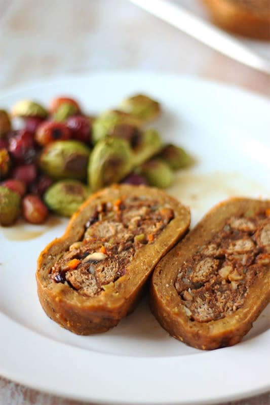 <p>Another Music in a Different Kitchen</p><p>Make stuffed seitan roast with savory mushroom-cranberry dressing wrapped in herbed poultry-flavored seitan roll the centerpiece of your holiday table.</p><p><strong>Get the recipe: <a href="https://anothermusicinadifferentkitchen.com/stuffed-seitan-roast/" rel="nofollow noopener" target="_blank" data-ylk="slk:Stuffed Seitan Roast;elm:context_link;itc:0;sec:content-canvas" class="link rapid-noclick-resp">Stuffed Seitan Roast</a></strong></p>