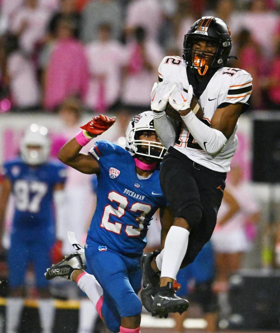 Central’s Noel Felix III, right, makes the catch covered by Buchanan’s Antonio Kemp, left, Thursday, Oct. 5, 2023 in Clovis. After struggling through the first half, Central won 27-6.