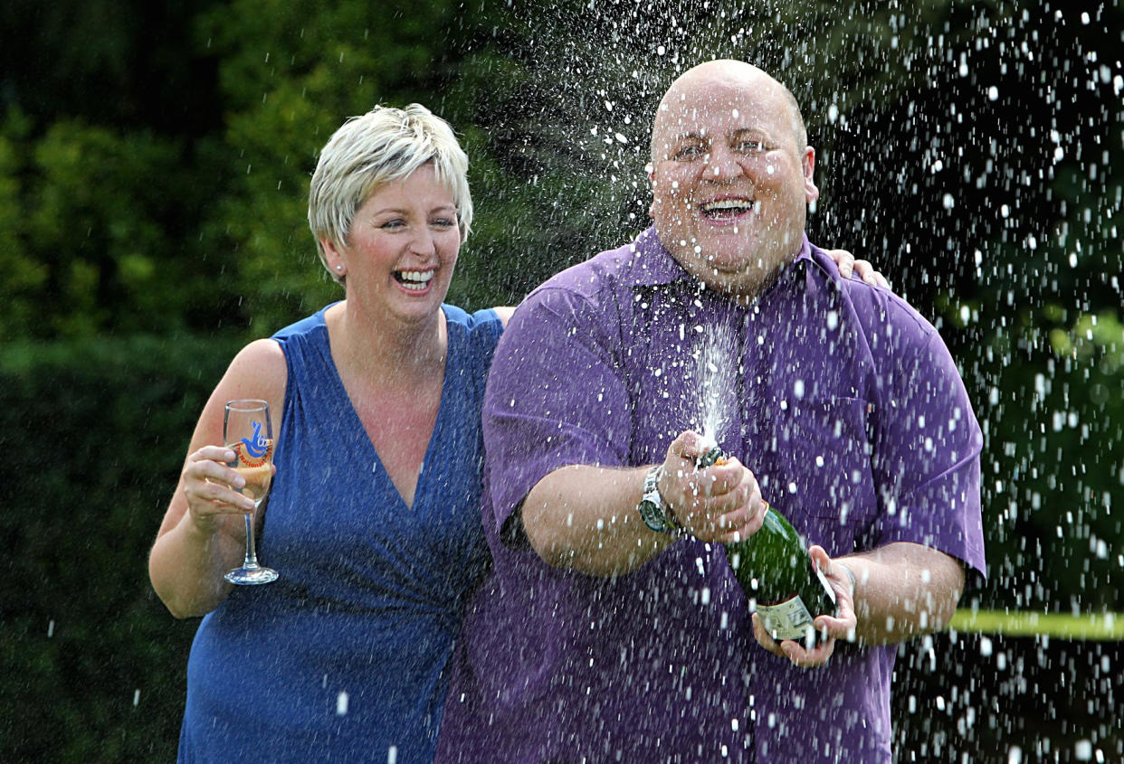 Adrian Bayford, 41, and wife Gillian, 40, from Haverhill, Suffolk, after a press conference at Down Hall Country House Hotel in Hatfield Heath, Hertfordshire, after they won �148.6 million on Friday's EuroMillions jackpot.