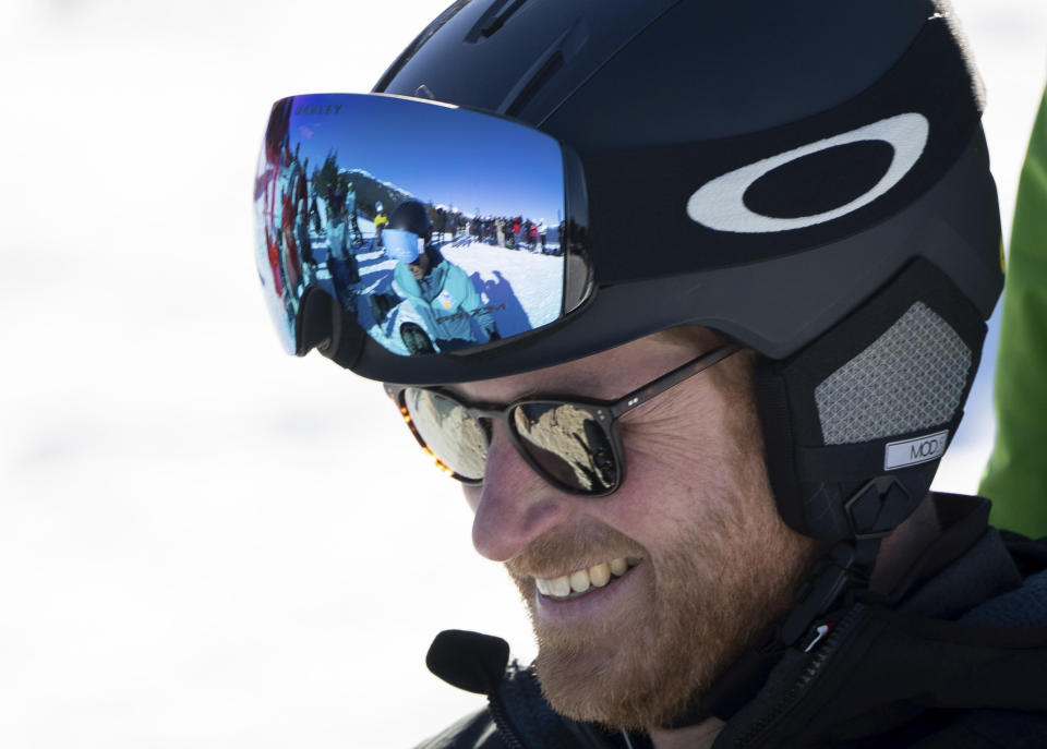 Britain's Prince Harry, The Duke of Sussex, prepares to ski with Invictus athletes during the Invictus Games training camp in Whistler, British Columbia, on Wednesday, Feb. 14, 2024. (Ethan Cairns/The Canadian Press via AP)