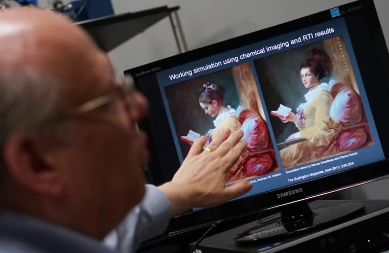 Delaney shows a picture of "Young Girl Reading" and a simulation of the underlying painting based on technology that split up the image into spectral bands of just a few nanometers wide