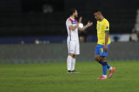 Brazil's Gabriel Jesus leaves the field after referee Patricio Loustau showed him the red card during a Copa America quarterfinal soccer match against Chile at the Nilton Santos stadium in Rio de Janeiro, Brazil, Friday, July 2, 2021. (AP Photo/Silvia Izquierdo)