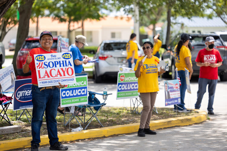 Campaign volunteers turned out as early voting began Aug. 16. Monica Colucci, endorsed by Gov. Ron DeSantis, defeated an incumbent on the school board in Miami-Dade. (Nathan Posner/Anadolu Agency/Getty Images)
