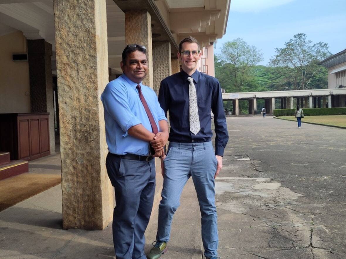 Roshan Madalagama and Joe Rubin together in Peradeniya, Sri Lanka, in March. The two scientists are working to address antimicrobial resistance in animals in that country. (Submitted by Joe Rubin - image credit)