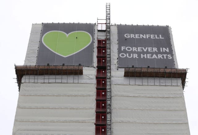 Grenfell Tower as seen from the Grenfell Memorial Wall in the grounds of Kensington Aldridge Academy 