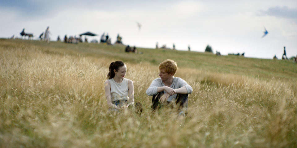 This image released by PBS shows Domhnall Gleeson, right, and Andrea Riseborough in a scene from MASTERPIECE "Alice & Jack," premiering Sunday March 17 on PBS. (Fremantle/PBS via AP)