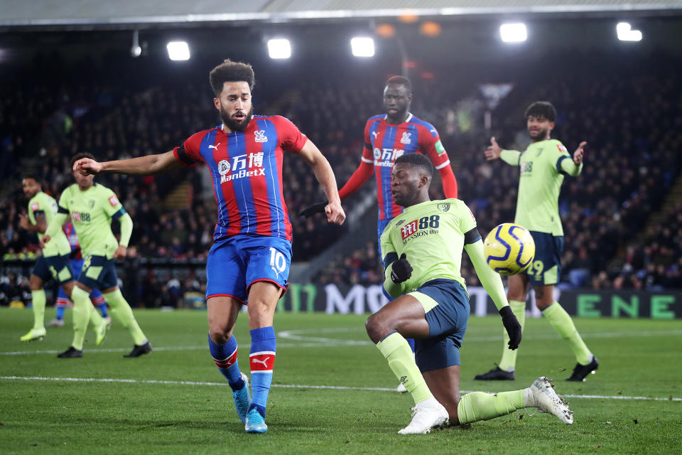 LONDON, ENGLAND - DECEMBER 03: Andros Townsend of Crystal Palace (L) is challenged by Jefferson Lerma of AFC Bournemouth during the Premier League match between Crystal Palace and AFC Bournemouth at Selhurst Park on December 03, 2019 in London, United Kingdom. (Photo by Jack Thomas/Getty Images)