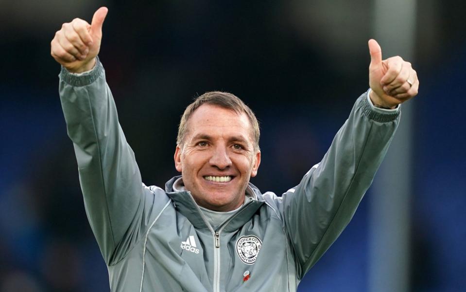 Brendan Rodgers has every right to have both thumbs up having led Leicester to third in the Premier League playing entertaining football - PA