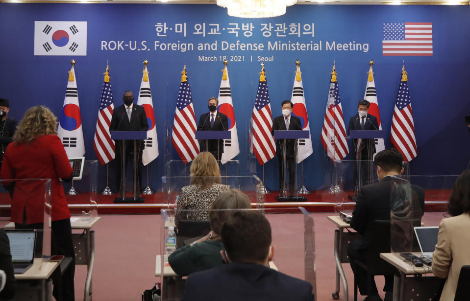 U.S. Secretary of State Antony Blinken, second from left, U.S. Defense Secretary Lloyd Austin, left, South Korean Foreign Minister Chung Eui-yong, second from right, and South Korean Defense Minister Suh Wook, right, listens to a reporter's question during the joint press conference after their meeting at the Foreign Ministry in Seoul, South Korea, Thursday, March 18, 2021. (AP Photo/Lee Jin-man, Pool)