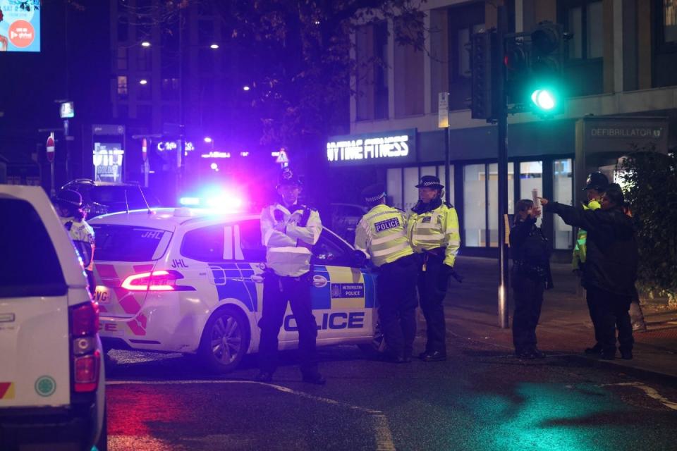 The scene after the stabbing in Sutton HMichaeligh Street (UKNIP)