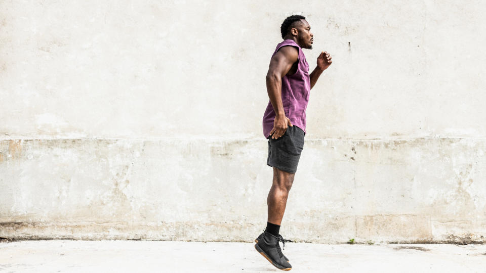 Man performing plyometric exercises poho hop